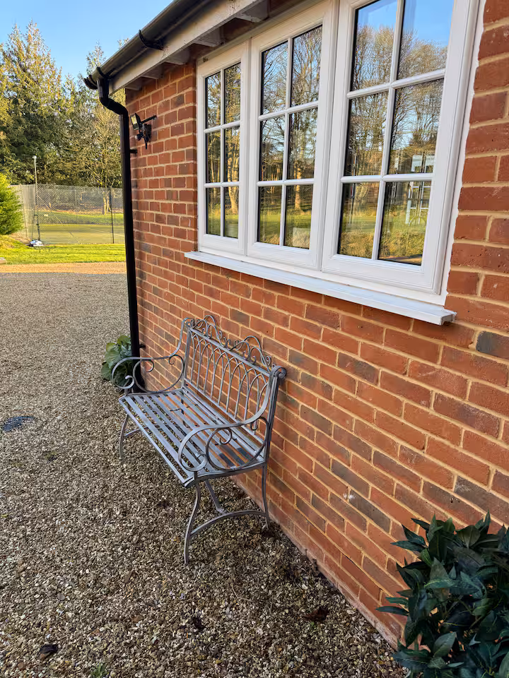 Bench by the front door